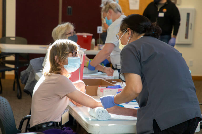 Senior woman receiving a blood test