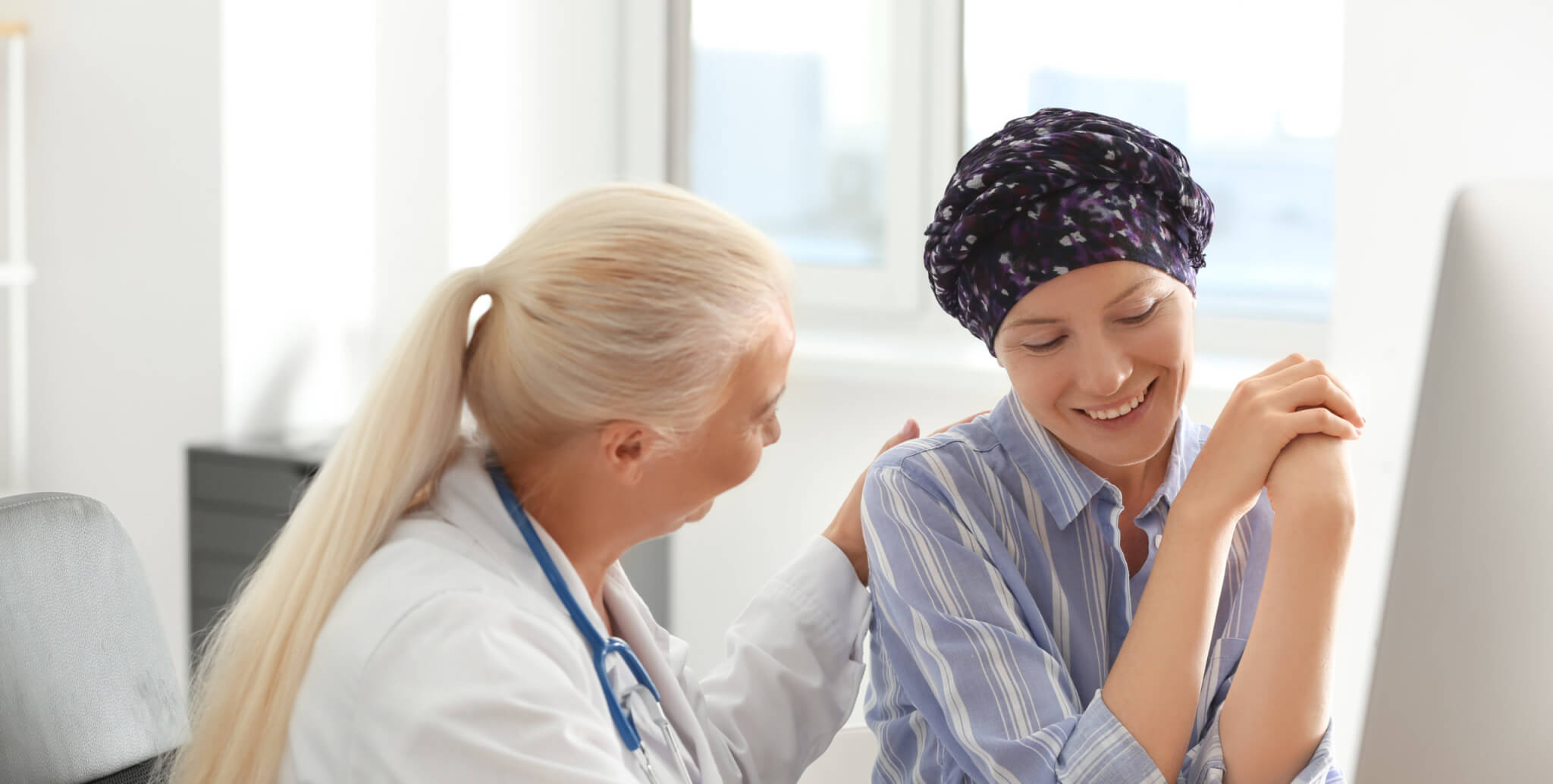 Woman after chemotherapy visiting doctor in hospital - most common types of cancer featured image
