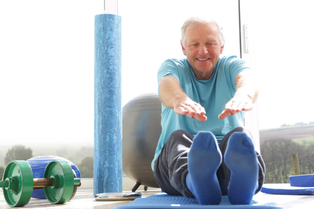 Senior man stretching
