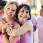 granddaughter hugging grandmother at charity run