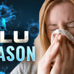 Flu virus and woman blowing nose with word art