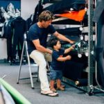 Father and son shopping together