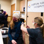 Nurse administering vaccine