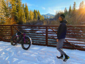 Man exercising in snowy mountains
