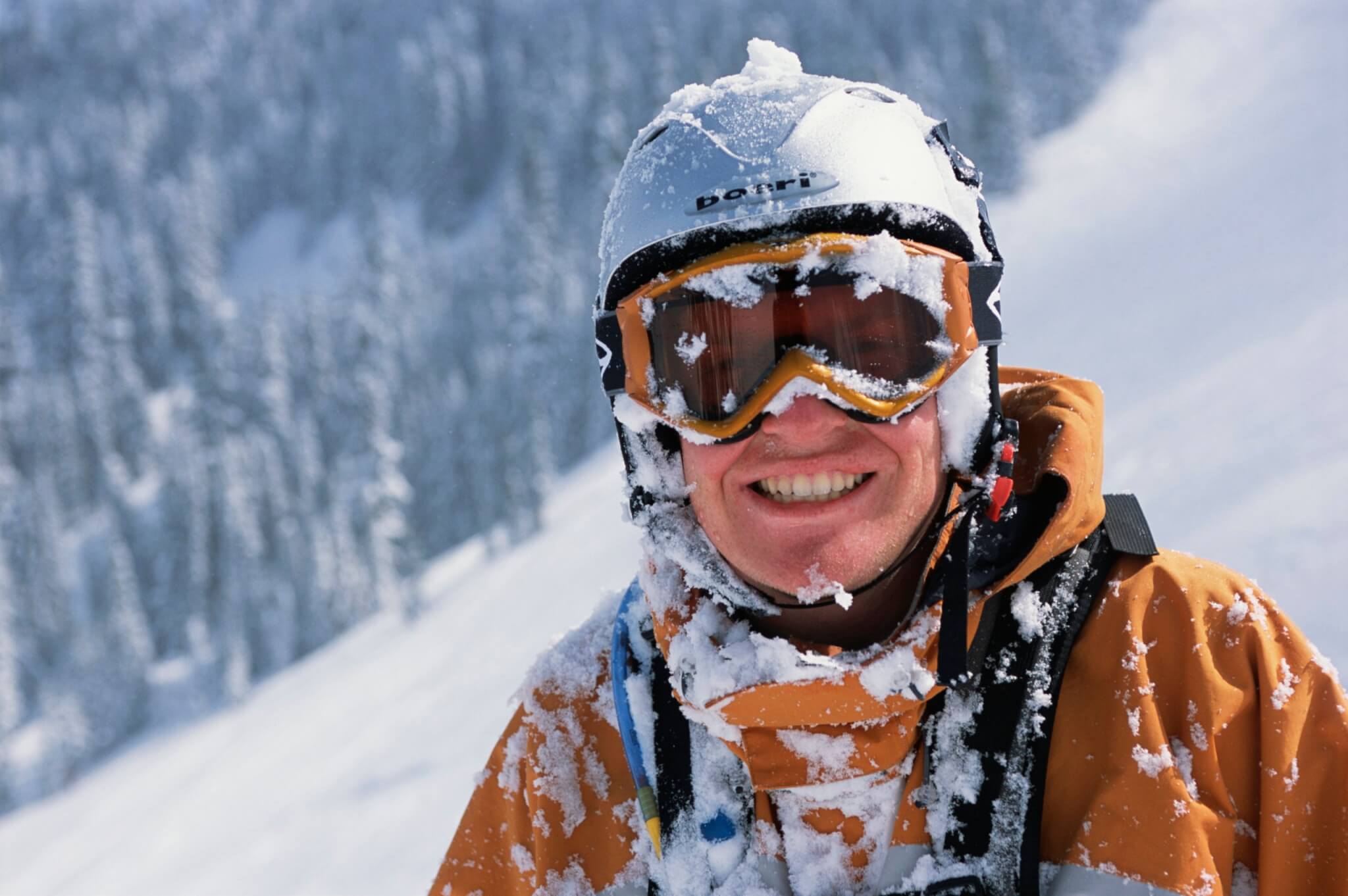 Skier covered in snow