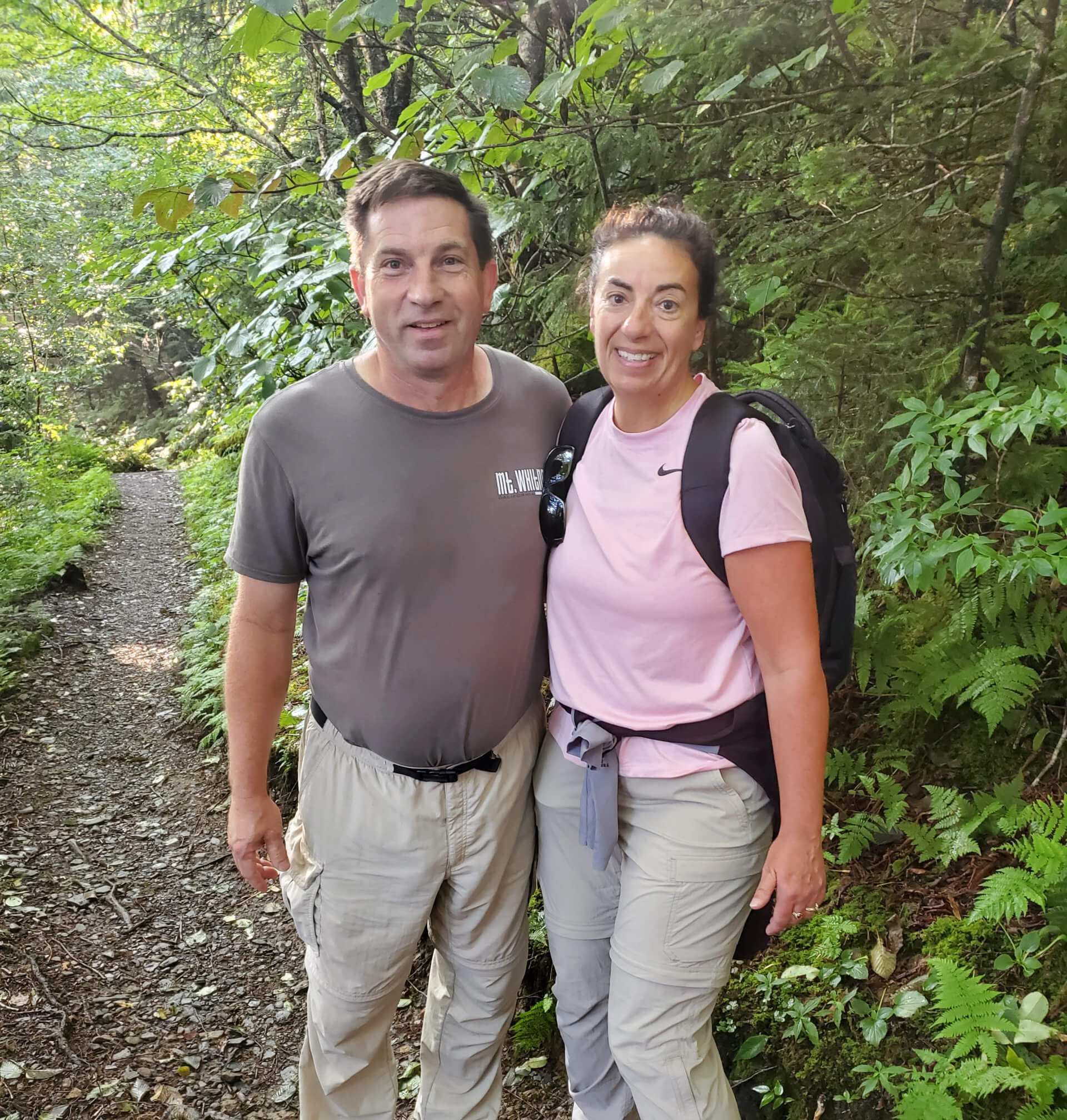 couple smiling on hike