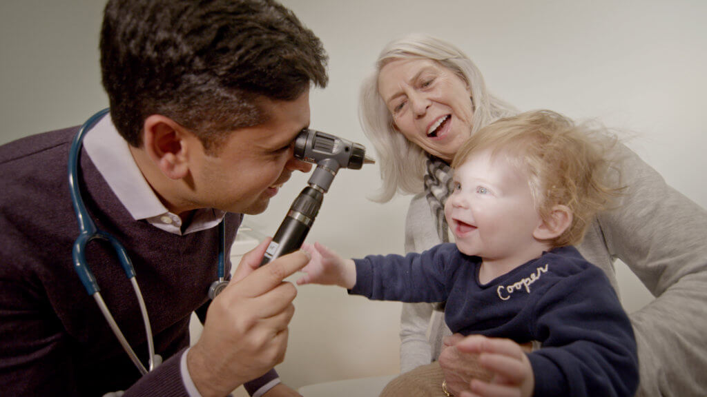 Toddler getting eye exam