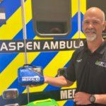 man holding first aid kit