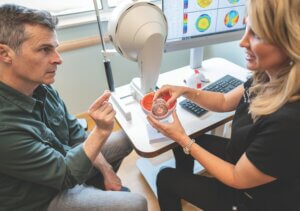 dr sanders discussing eye care with a patient