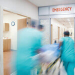 how to handle health emergencies Doctor wheeling patient