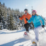 Paar beim Schneeschuh-Wandern, Österreich, Salzburger Land, Altenmarkt-Zauchensee a joint effort featured image
