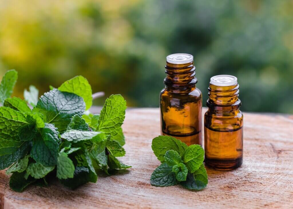 two bottles of peppermint essential oils used for nasal and sinus congestion