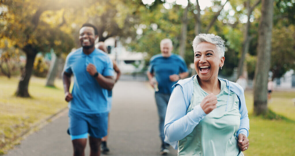 woman running with a group of people showing how to improve gut health